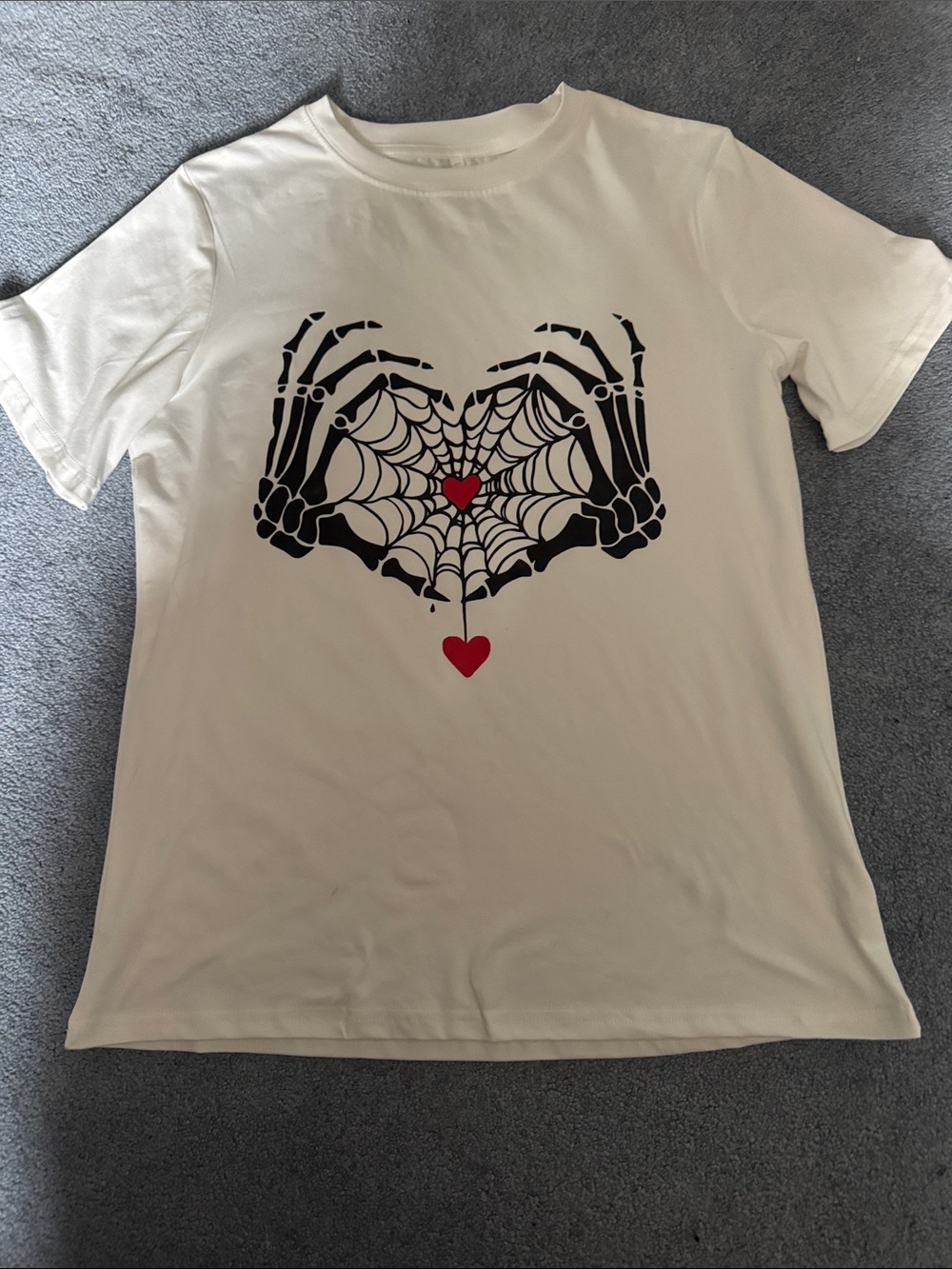 White Graphic Tee with Skeleton Hands & Red Hearts